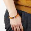 embossed logo leather bracelet w/stainless steel closure